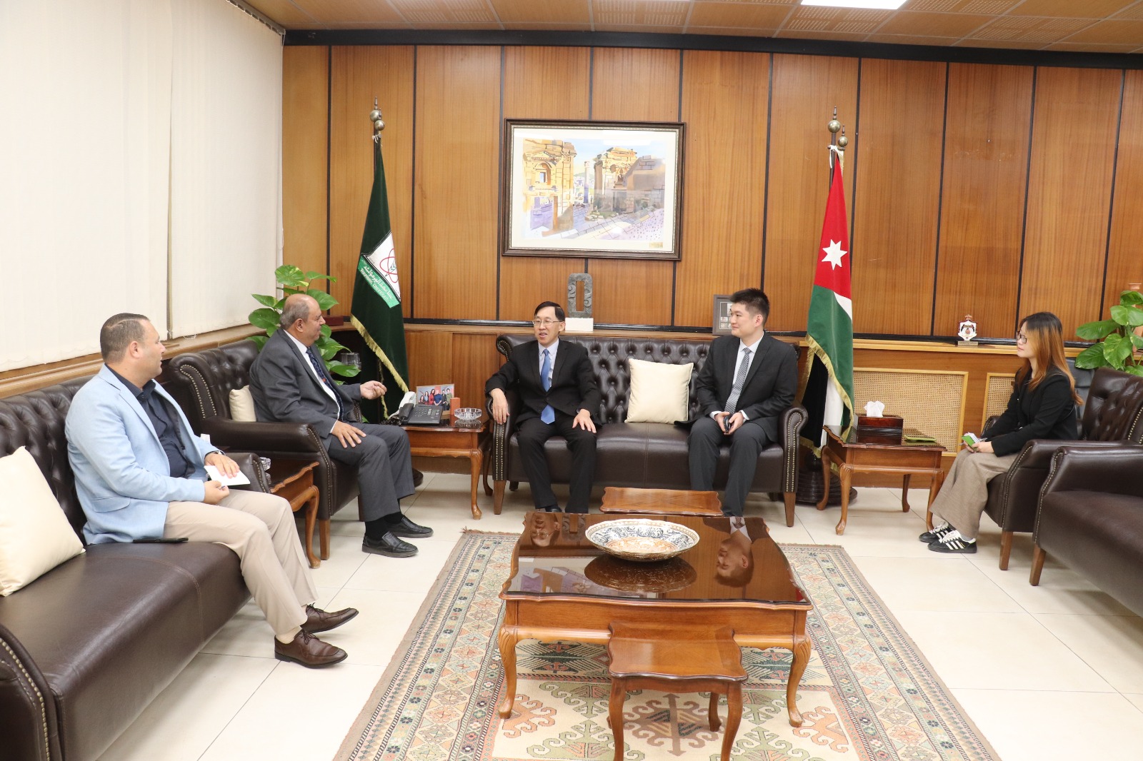 Al-Nasser discusses with Cheng Yongru ways to strengthen the relations between Yarmouk University and the Chinese Embassy in Amman.